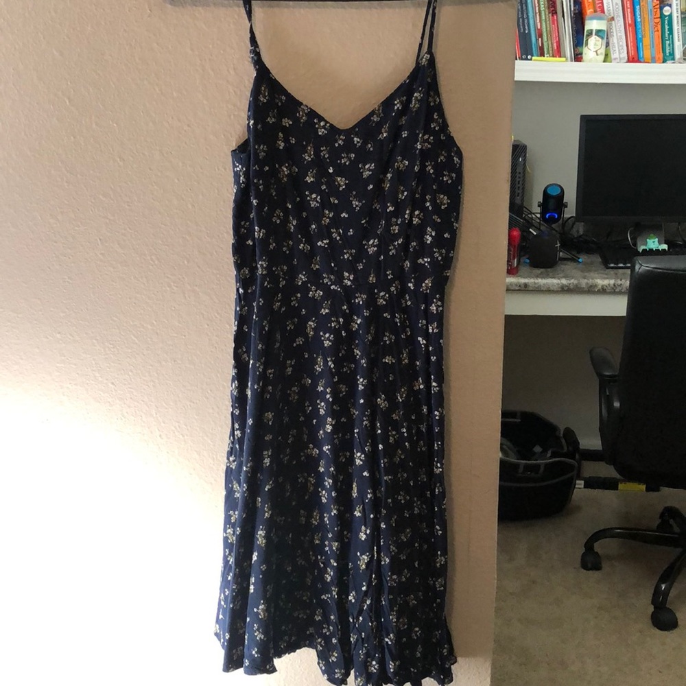Worn a few times as well but still in good condition. Size is XS.